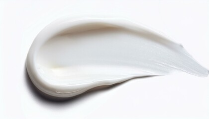 creamy smear of white cosmetic texture on white background skin care concept