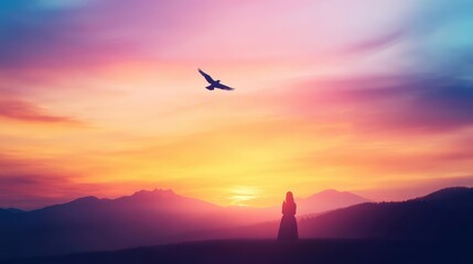 Obraz premium Majestic Bird Soaring Over Rugged Mountain Peaks Bathed in Vibrant Sunset Colors Reflecting a Peaceful and Awe-Inspiring Natural Landscape