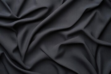 Obraz premium Luxurious Black Silk Fabric Draped Elegantly Over Soft Surface with Smooth Texture and Subtle Sheen Evoking Opulence and Timeless Sophistication