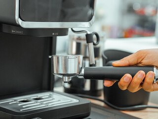 Coffee shop business. Bar counter and various equipment. shop with coffee making equipment, close-up corner of grinding coffee, measuring water. Ground coffee caffeine for drink work or mornings 