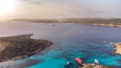 A sunset over Blue Lagoon in Comino Island © ewelinaf