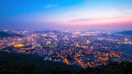 Fototapeta premium Night Panorama of Urban Cityscape with Dazzling Lights and Sky