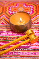 tuning fork on a fabric.