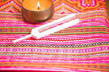tuning fork on a fabric.