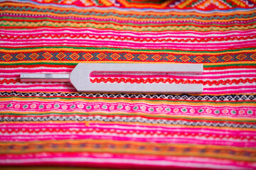tuning fork on a fabric.