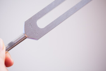 tuning fork on a fabric.