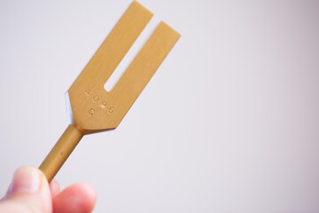 tuning fork on a fabric.