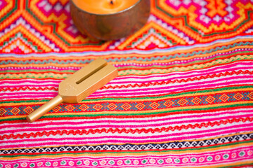 tuning fork on a fabric.