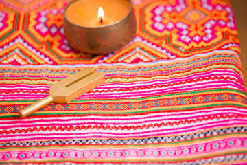 tuning fork on a fabric.