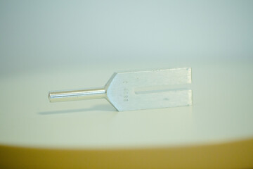 tuning fork on a fabric.