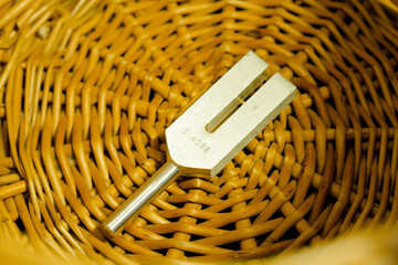 tuning fork on a fabric.