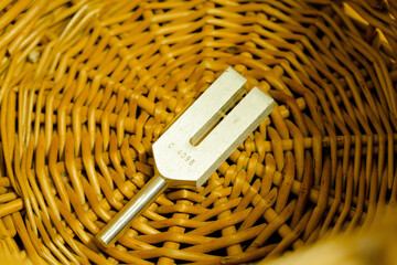 tuning fork on a fabric.