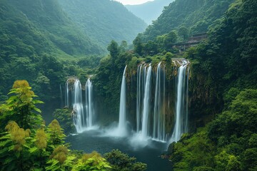 Fototapeta premium Stunning waterfalls cascade down rocky cliffs surrounded by lush greenery in a serene landscape