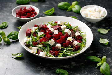 Fresh Beetroot feta salad with wild rocket and lemon dressing. Healthy food.