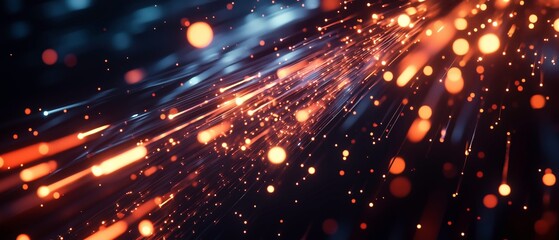 Glowing Trails of Light: Abstract image of vibrant orange and blue sparks streaking across a dark background, creating a dynamic and energetic visual.  The fiery trails evoke a sense of speed.