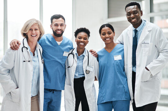 Happy people, confident or portrait of doctors with smile in hospital services or about us. Healthcare, proud medical professional or group of nurses with support and teamwork at wellness clinic