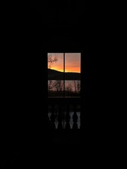 Sunset view through window frame