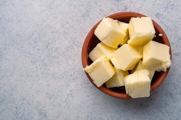 Butter that adds flavor to meals and is for breakfast on white  background