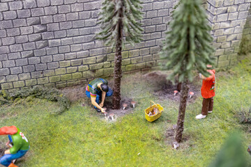 Mushroom Foraging in the Forest: People Collecting Mushrooms Under Tall Trees with a Basket Nearby