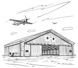 Fototapeta premium Airplane Flying Over a Large Hangar Building