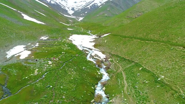 Aerial view of the valley, Parwan Province , Afghanistan, river and grass, in the spring, in daylight.