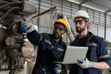 Group of professional male engineer maintenance automatics robotic arm welding in industry factory....