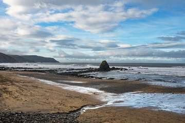 Fototapeta premium Winter sunny dawn on Widemouth Bay beach