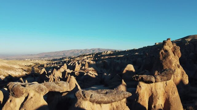 Watch Devrent Valley from above with a drone. Natural landscape of fairy chimneys and rock formations.
