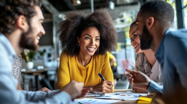 Diverse professional executive business team people discuss project sit at meeting table in board room. Multicultural company managers brainstorm financial plan working together in boardroom. Top vie
