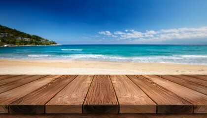 Fototapeta premium Empty rustic wooden table on blur background of beautiful beach for mockup summer product display or travel ad. Picnic table with customizable space on table-top for editing.