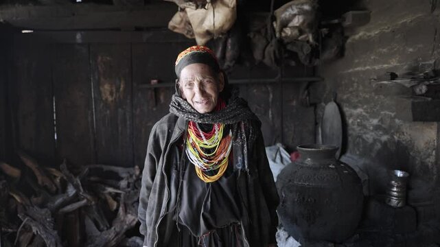Kalash People. Oldest Woman in Bumburet Valley, Grandmother Kalashi. Elder woman in Hut at Winter, Chitral, Pakistan.