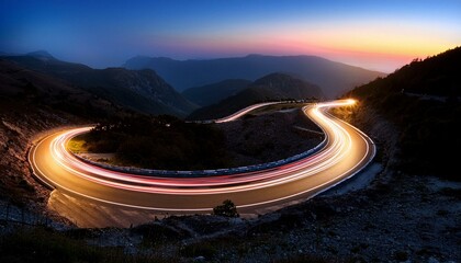 A long exposure photograph of a winding road with car light trails 