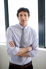 Fototapeta premium Arms crossed, portrait and businessman in office for justice, professional career and lawyer for court. Smile, mature person and attorney with confidence for legal aid, law firm and corporate case