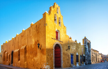 Yellow church and colonial architecture in Campeche, Mexico