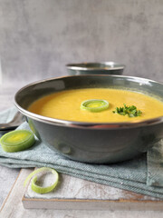 Creamy Leek Soup with Cheddar Cheese, Garnished with Leek Rings and Parsley