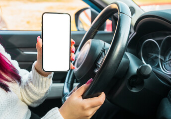 Female driver shows her phone, open space for design, Mockup place