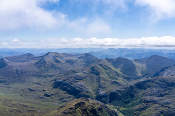 Aerial View of the Scottish Highlands With Clouds and Green Slopes Near the Summit of Ben Nevis