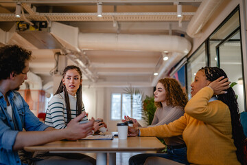 Fototapeta premium multicultural work team have meeting research together on work desk