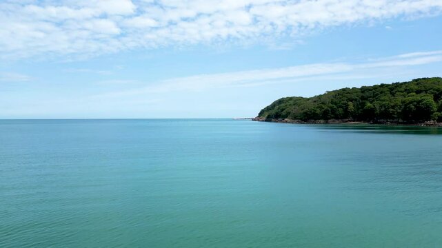 Aerial footage flying over the ocean