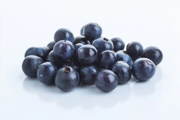 Fototapeta premium Fresh organic tomatoes bursting with flavor resting on a pristine white background for a culinary presentation