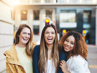 Women, laughing and outdoor portrait in city, holiday travel and bonding together for friendship....
