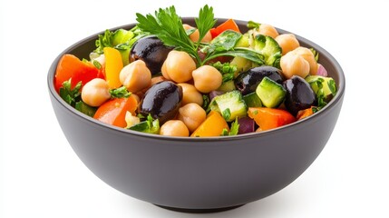 Fresh Vegetable Salad with Chickpeas and Olives in Black Bowl