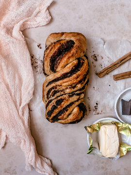 chocolate and cinnamon babka pink background