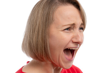 A young woman with short hair screaming with an intense expression against a white background.