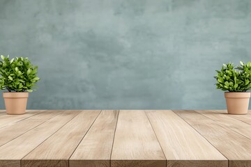 Potted plants on wooden table with green background.