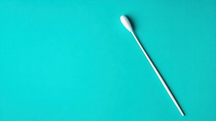 White Cotton Swab on a Bright Turquoise Background