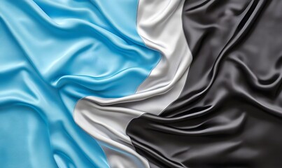 Draped blue, white, and black fabric; abstract background; design texture