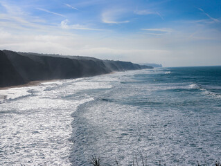 waves crashing on rocks