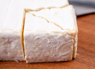 French soft squared pont l'eveque cow cheese from Calvados department, Normandy, France