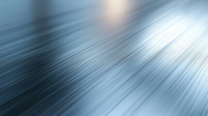 Brushed metallic surface with soft glowing reflections and smooth motion blur